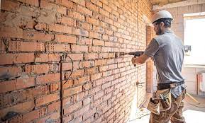 Unveiling the Benefits of Hiring Tuckpointing Contractors for Your Masonry Restoration